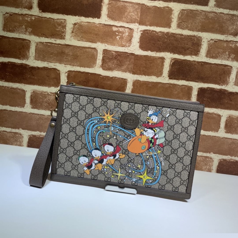G*u*i clutch bags